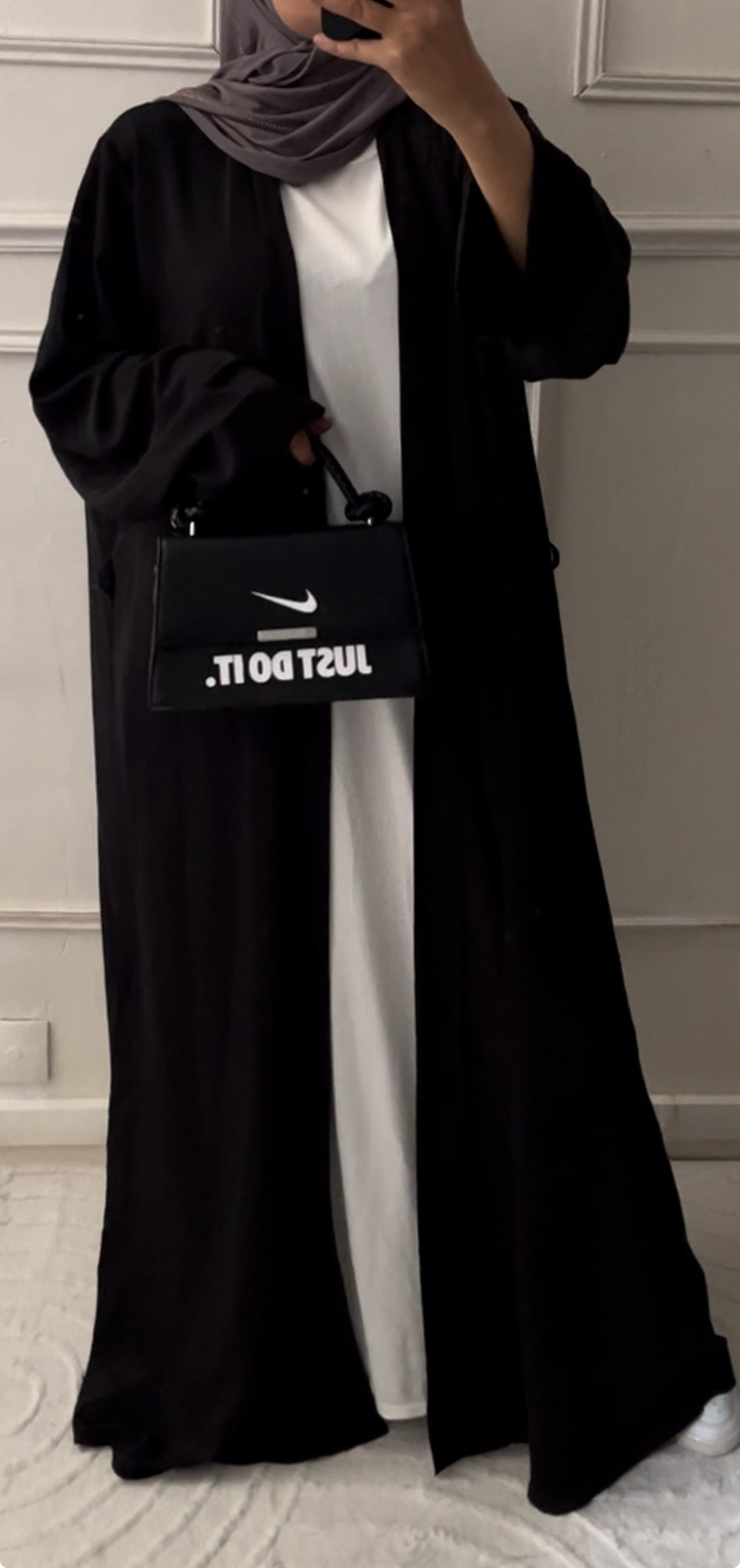 UNDER ABAYA